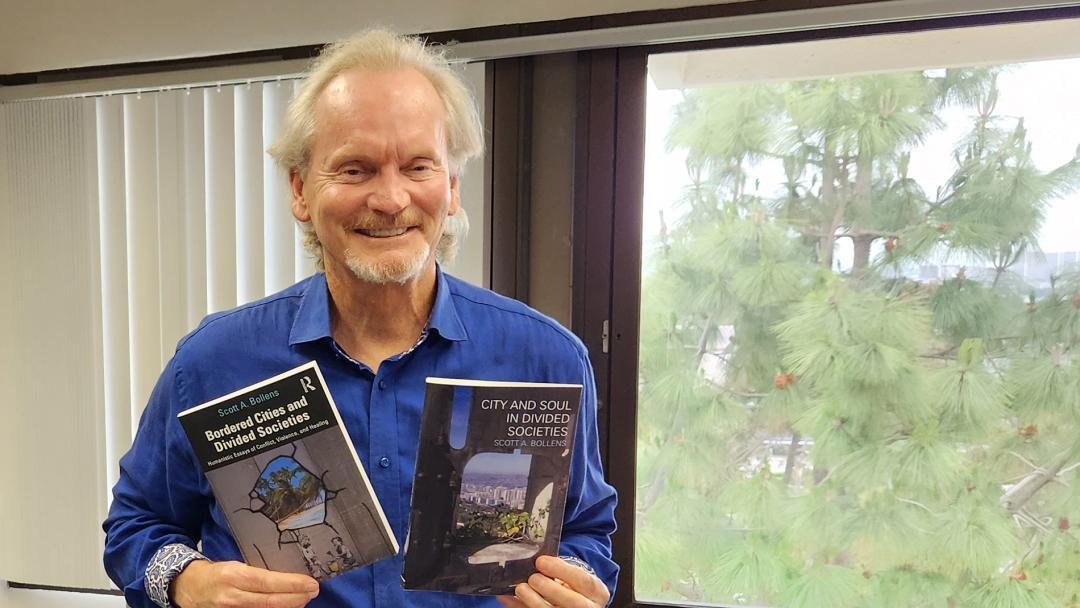 Bollens with book Precipice